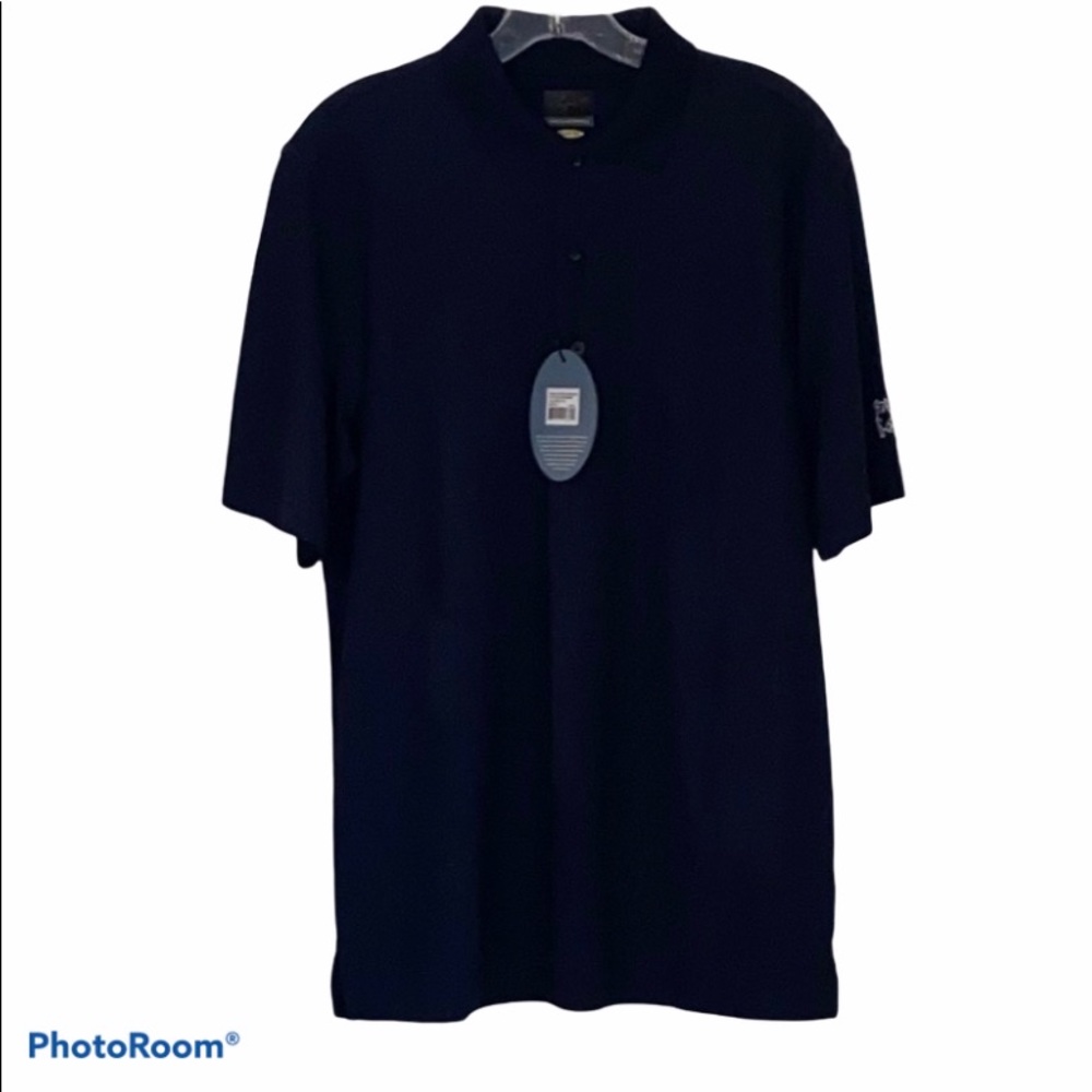 Greg Norman woman’s navy polo, size s/p, NWT